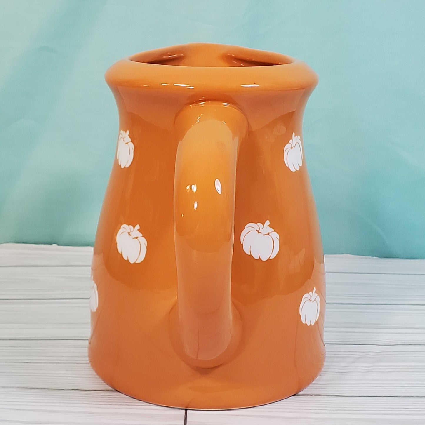 Terramotto Ceramic 40 oz Dark Orange Fall Pitcher with White Pumpkin Motif